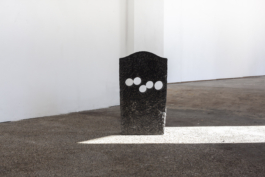 unvergessen, detail black granite, letters, work by Laura Jatkowski